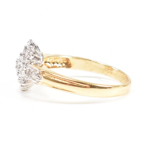 95 - A hallmarked 18ct gold and diamond cluster ring. Estimated diamond weight 0.50ct. Weight 3.6g. Size ... 