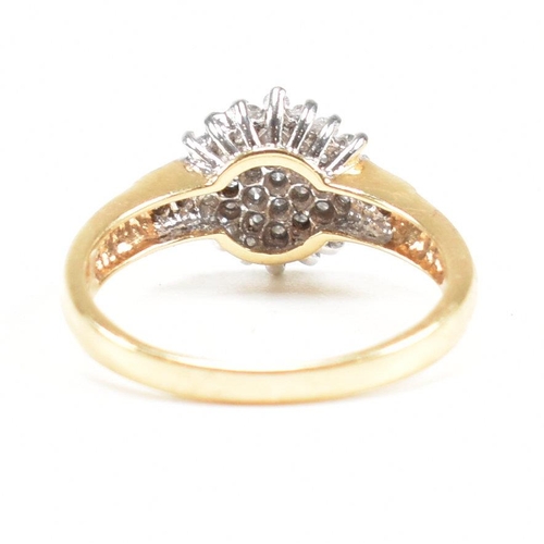 95 - A hallmarked 18ct gold and diamond cluster ring. Estimated diamond weight 0.50ct. Weight 3.6g. Size ... 