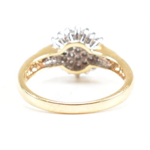 95 - A hallmarked 18ct gold and diamond cluster ring. Estimated diamond weight 0.50ct. Weight 3.6g. Size ... 