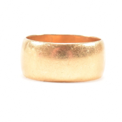 97 - A hallmarked 18ct gold band ring. The ring hallmarked Birmingham. Weight 9.8g. Size Q. All weights, ... 