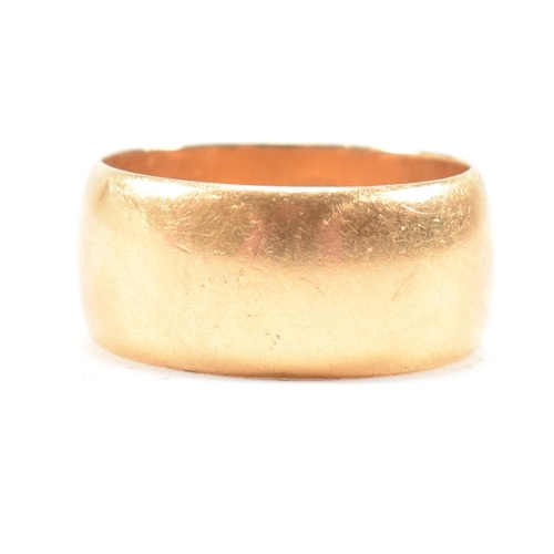 97 - A hallmarked 18ct gold band ring. The ring hallmarked Birmingham. Weight 9.8g. Size Q. All weights, ... 