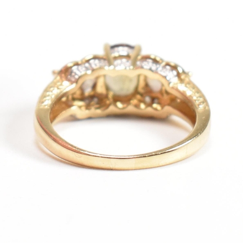 98 - A yellow gold andalusite and diamond ring. Weight approx 4.5g. Size approx  O-P. All weights, measur... 