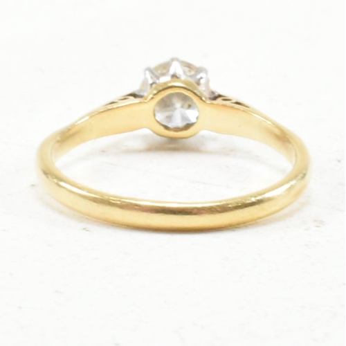 31 - A hallmarked 18ct gold and diamond solitaire ring. The ring set with a round brilliant cut diamond t... 