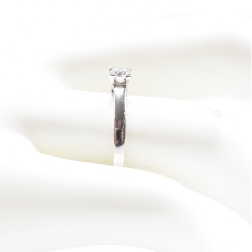 170 - A hallmarked 9ct white gold and diamond solitaire ring.  Estimated diamond weight 0.25ct.  Weight ap... 