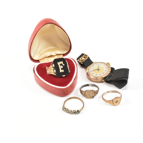 192 - An assorted collection of Victorian and later rolled gold rings and a wristwatch. The lot to include... 