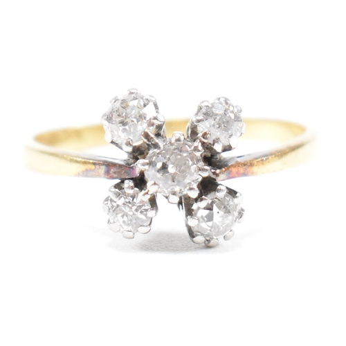 275 - A hallmarked 18ct gold and diamond five stone cluster ring.  The ring set with five old cut diamonds... 