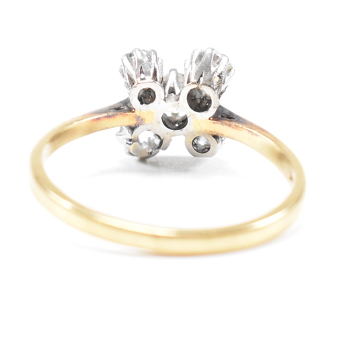 275 - A hallmarked 18ct gold and diamond five stone cluster ring.  The ring set with five old cut diamonds... 