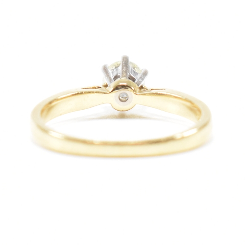 300 - A hallmarked 18ct gold and diamond solitaire ring. The ring set with a single claw mounted diamond t... 