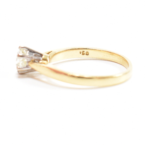 300 - A hallmarked 18ct gold and diamond solitaire ring. The ring set with a single claw mounted diamond t... 