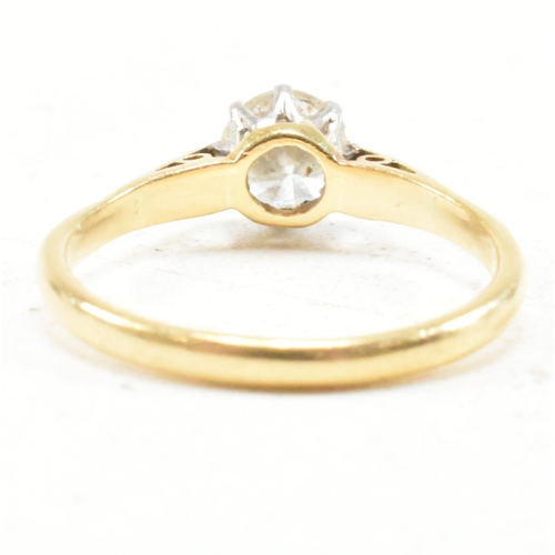 31 - A hallmarked 18ct gold and diamond solitaire ring. The ring set with a round brilliant cut diamond t... 