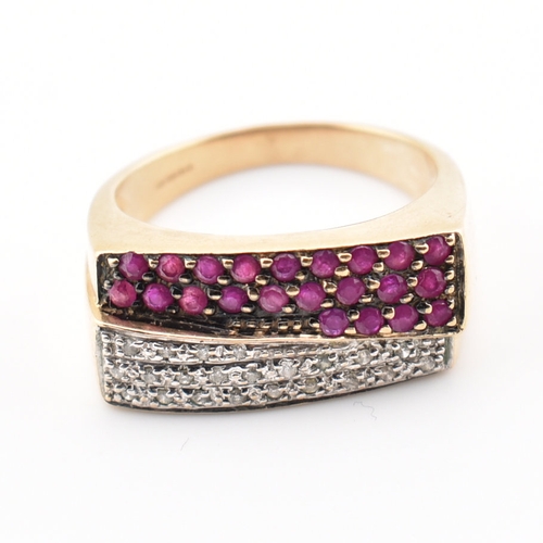 333 - A hallmarked 9ct yellow ruby & diamond cluster ring. The ring having an undulating crossover style r... 