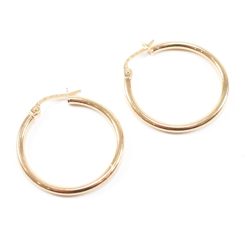 380 - Two pairs of Italian 9ct gold tube hoop earrings together with a pair of unmarked pair of yellow and... 