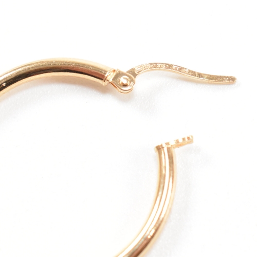 380 - Two pairs of Italian 9ct gold tube hoop earrings together with a pair of unmarked pair of yellow and... 