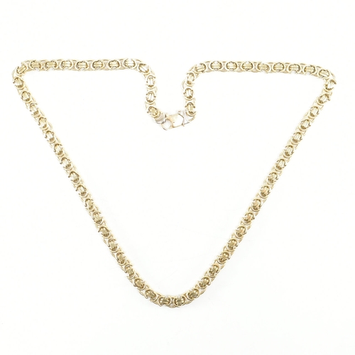 417 - A hallmarked 9ct yellow gold byzantine necklace chain. The chain comprised of flat byzantine links u... 