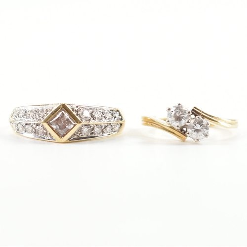 419 - Two 14ct gold and cz dress rings. The lot to include a two stone crossover ring hallmarked London, s... 