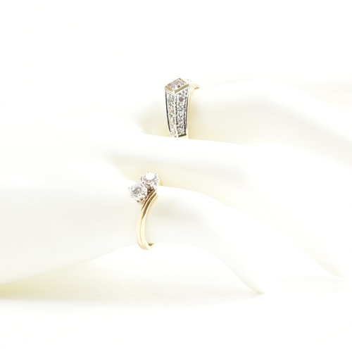 419 - Two 14ct gold and cz dress rings. The lot to include a two stone crossover ring hallmarked London, s... 