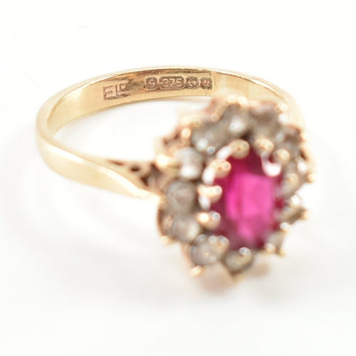 424 - Two hallmarked 9ct gold stone set rings. The lot to include a synthetic ruby ring surrounded by whit... 