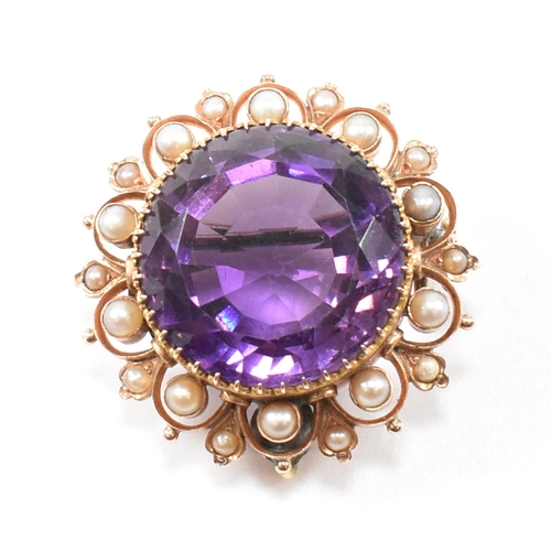 471 - An early 20th century amethyst and pearl brooch pin.  The brooch set with a central mixed cut amethy... 