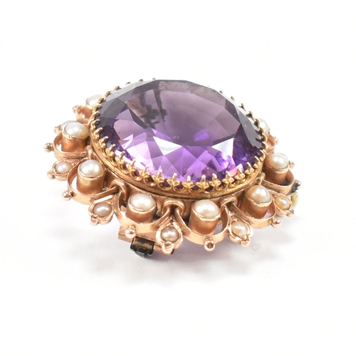 471 - An early 20th century amethyst and pearl brooch pin.  The brooch set with a central mixed cut amethy... 