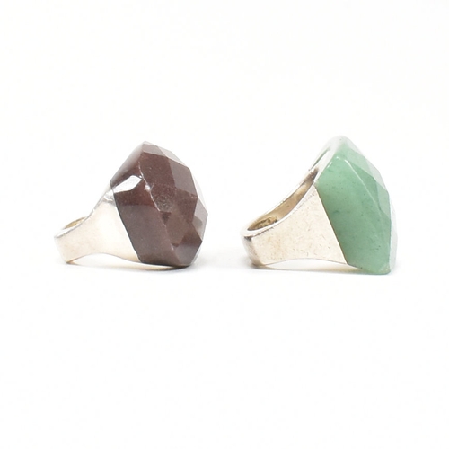 474 - Two 925 silver & quartz set dress rings. The first having a faceted rectangular cut green aventurine... 