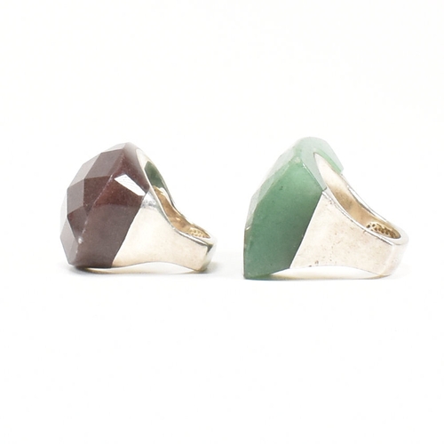 474 - Two 925 silver & quartz set dress rings. The first having a faceted rectangular cut green aventurine... 