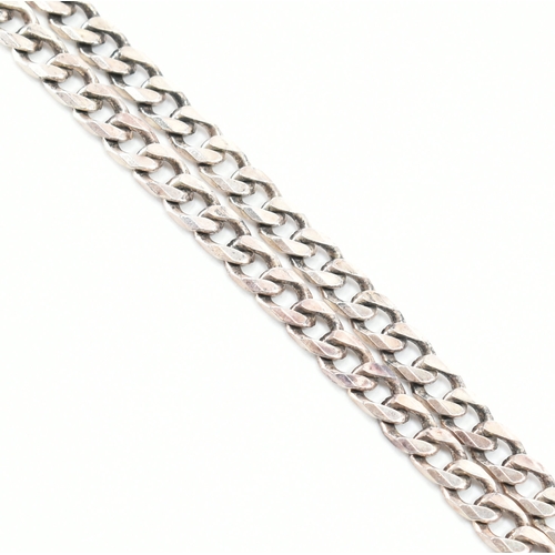 476 - A hallmarked silver curb link necklace chain. The chain comprised of flat curb links united by a lob... 