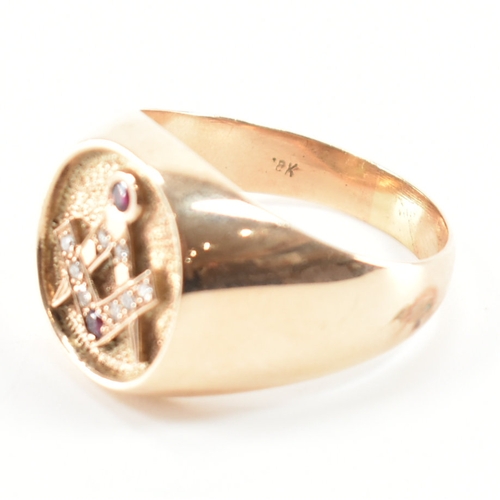 494 - An 18ct yellow gold, diamond & ruby set Masonic signet ring. The ring having an oval head with diamo... 