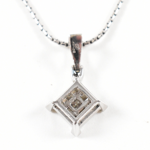 496 - A hallmarked 18ct white gold and diamond pendant necklace.  The necklace strung with a square pendan... 