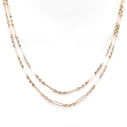 499 - A 9ct gold figaro link necklace chain. The chain having bar links interspersed with three attaching ... 