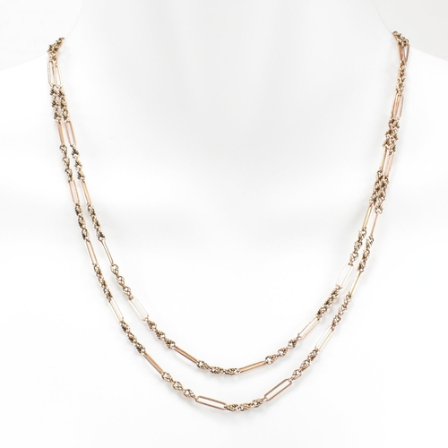 499 - A 9ct gold figaro link necklace chain. The chain having bar links interspersed with three attaching ... 