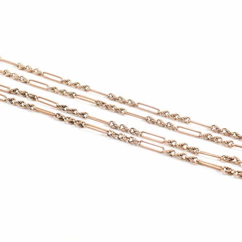 499 - A 9ct gold figaro link necklace chain. The chain having bar links interspersed with three attaching ... 