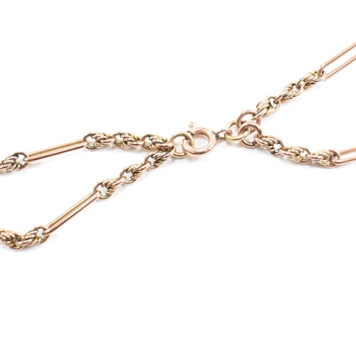 499 - A 9ct gold figaro link necklace chain. The chain having bar links interspersed with three attaching ... 