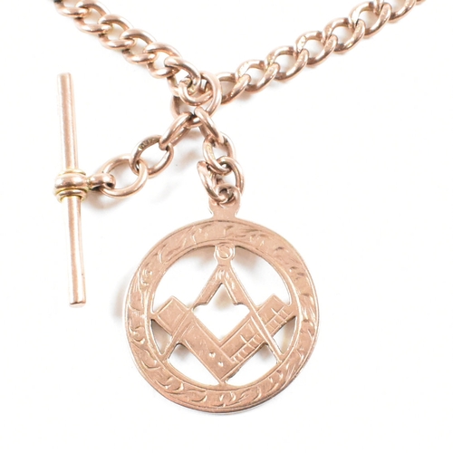 500 - A hallmarked early 20th century 9ct gold Albert chain and Masonic fob pendant. The Albert chain with... 