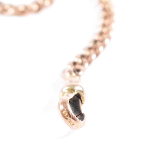 500 - A hallmarked early 20th century 9ct gold Albert chain and Masonic fob pendant. The Albert chain with... 