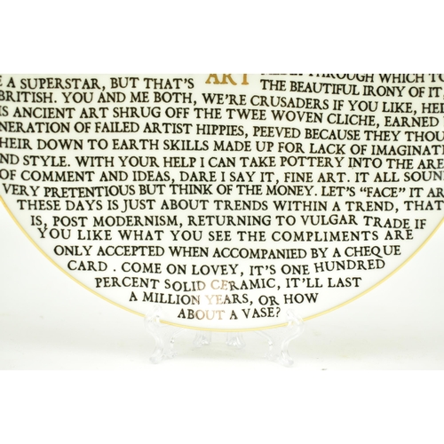 35 - Grayson Perry (British, b 1960) 
 100% ART 
 Fine bone china plate with gold lustre
 Developed for t... 