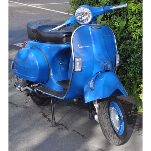549 - MYX 552X - 2001 Vespa (Piaggio) Model PX125E moped scooter in blue. Manufactured in 1982 and first r... 