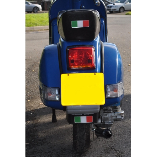 549 - MYX 552X - 2001 Vespa (Piaggio) Model PX125E moped scooter in blue. Manufactured in 1982 and first r... 