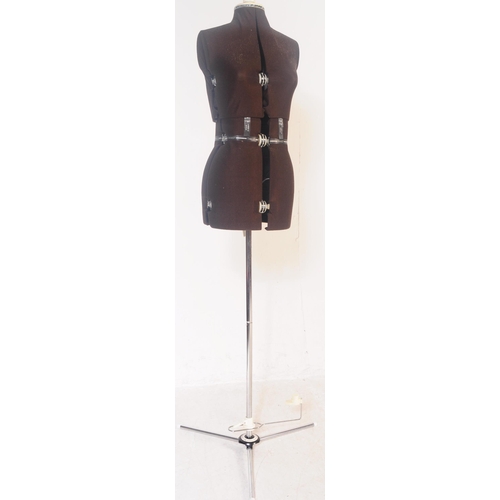 551 - A vintage mid 20th century circa 1960s-70s tailor's or dressmaker's adjustable mannequin with brown ... 
