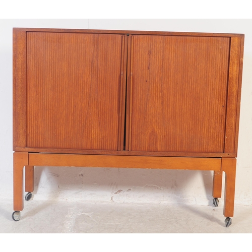 553 - British Modern Design - A vintage mid 20th century teak wood small sideboard / cabinet. Of rectangul... 