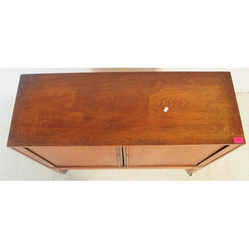 553 - British Modern Design - A vintage mid 20th century teak wood small sideboard / cabinet. Of rectangul... 
