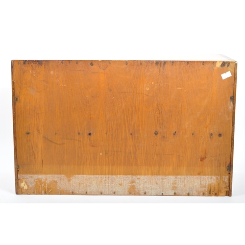 562 - A mid 20th century vintage teak and plywood medicine wall cabinet fitting. Comprising of twin hinged... 