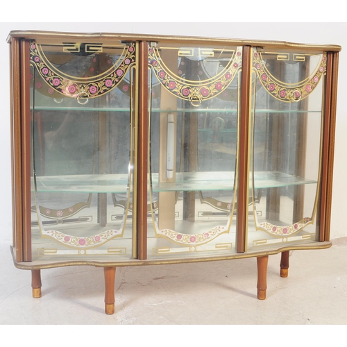 564 - A vintage mid 20th century circa 1960s glass mirror back display cabinet. The cabinet having mirror ... 
