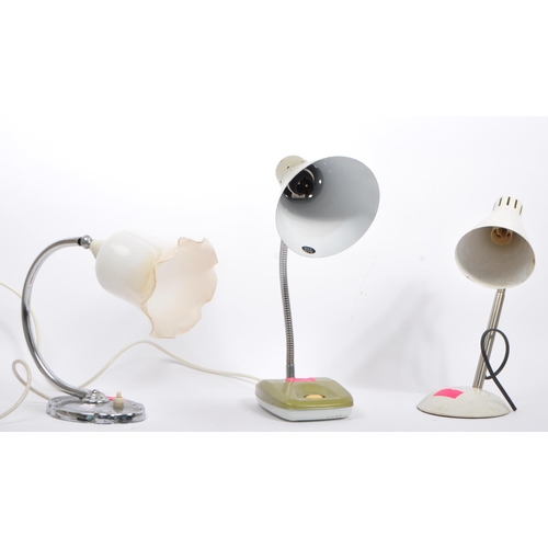 573 - A collection of three retro 20th Century table / desk lamps. Comprising a green enamel / aluminium p... 