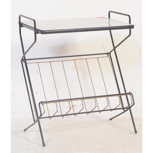 576 - A retro 1960s formica topped magazine rack / coffee table / low table having a black fleck on white ... 
