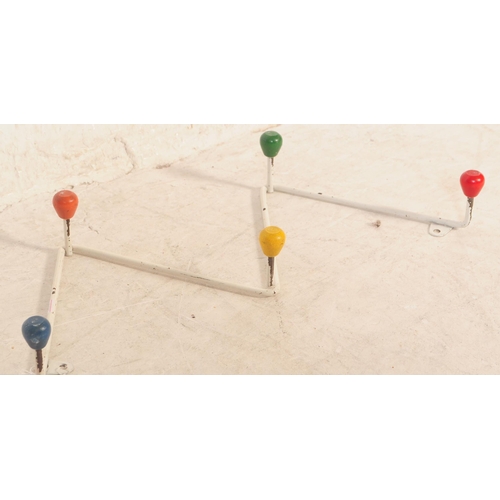 578 - A retro mid 20th Century sputnik atomic coat hooks / rack of 'W' shape form with painted multi colou... 