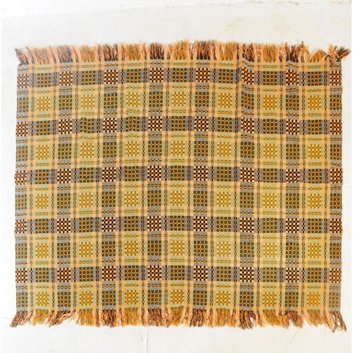 584 - A vintage 20th century Welsh blanket. Of rectangular form with orange ground, geometric repeating sq... 