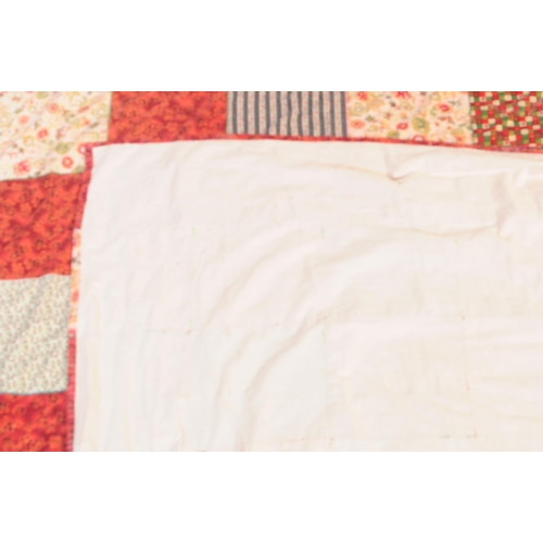 584 - A vintage 20th century Welsh blanket. Of rectangular form with orange ground, geometric repeating sq... 