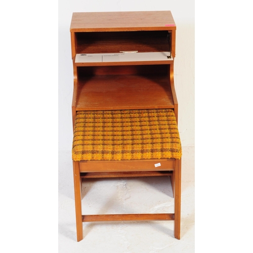 617 - Chippy Heath - A vintage mid 20th century teak telephone table by Mr Chippy. Of rectangular form wit... 