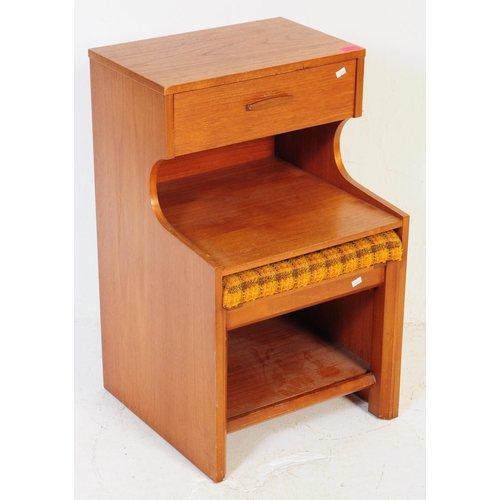 617 - Chippy Heath - A vintage mid 20th century teak telephone table by Mr Chippy. Of rectangular form wit... 