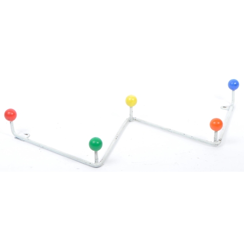 622 - A good retro collection of two white “W” shaped atomic coat hooks with multi-coloured balls to ends,... 